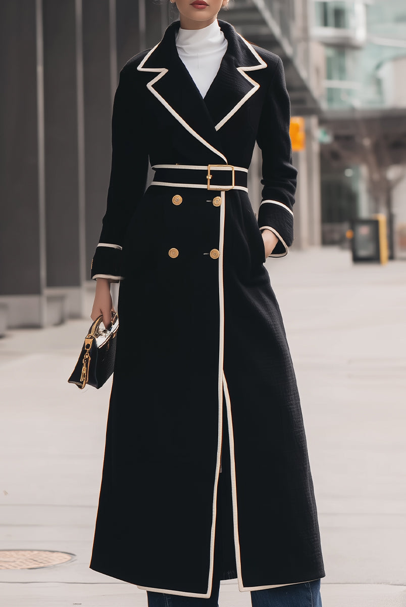 Black Colleen double-breasted belted long coat by Lumina Vancouver, shown on a model with classic lapels and a waist belt.