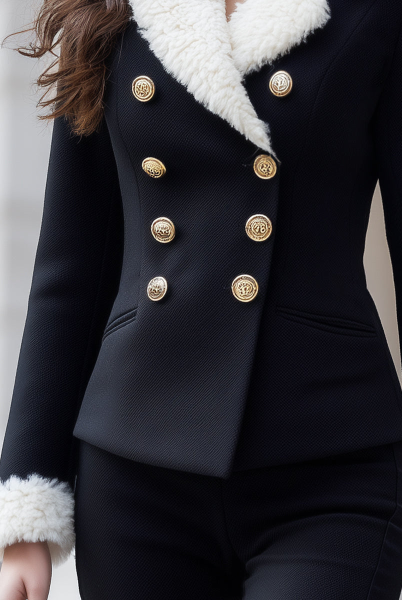 Lumina Wear black double-breasted blazer with faux shearling trim, shown on a model, size XS, stylish and tailored look.