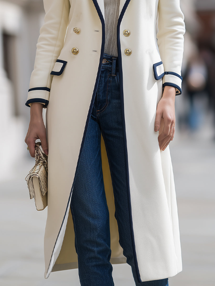 Theodora double-breasted coat by Lumina Vancouver with navy contrast trim, shown in white fabric, XS size, front view.