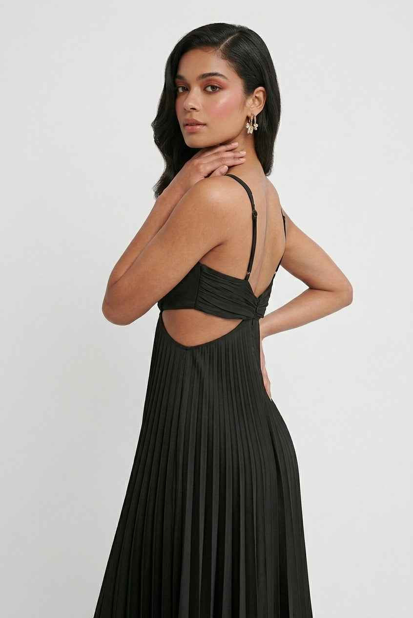 Elegant black pleated dress by Lumina Wear featuring a flattering silhouette, perfect for stylish occasions.