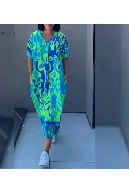 Blue Terttu elegant dress by Lumina Wear featuring a fitted silhouette and stylish design, displayed on a mannequin.