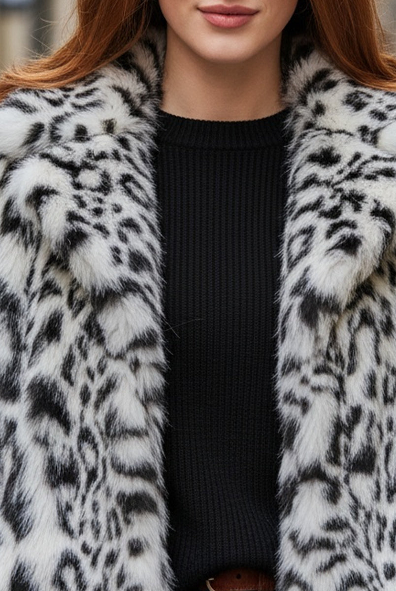 White Doris faux fur jacket by Lumina Vancouver, shown on a model, featuring plush texture and stylish design.