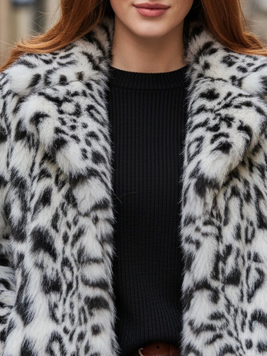 White Doris faux fur jacket by Lumina Vancouver, shown on a model, featuring plush texture and stylish design.