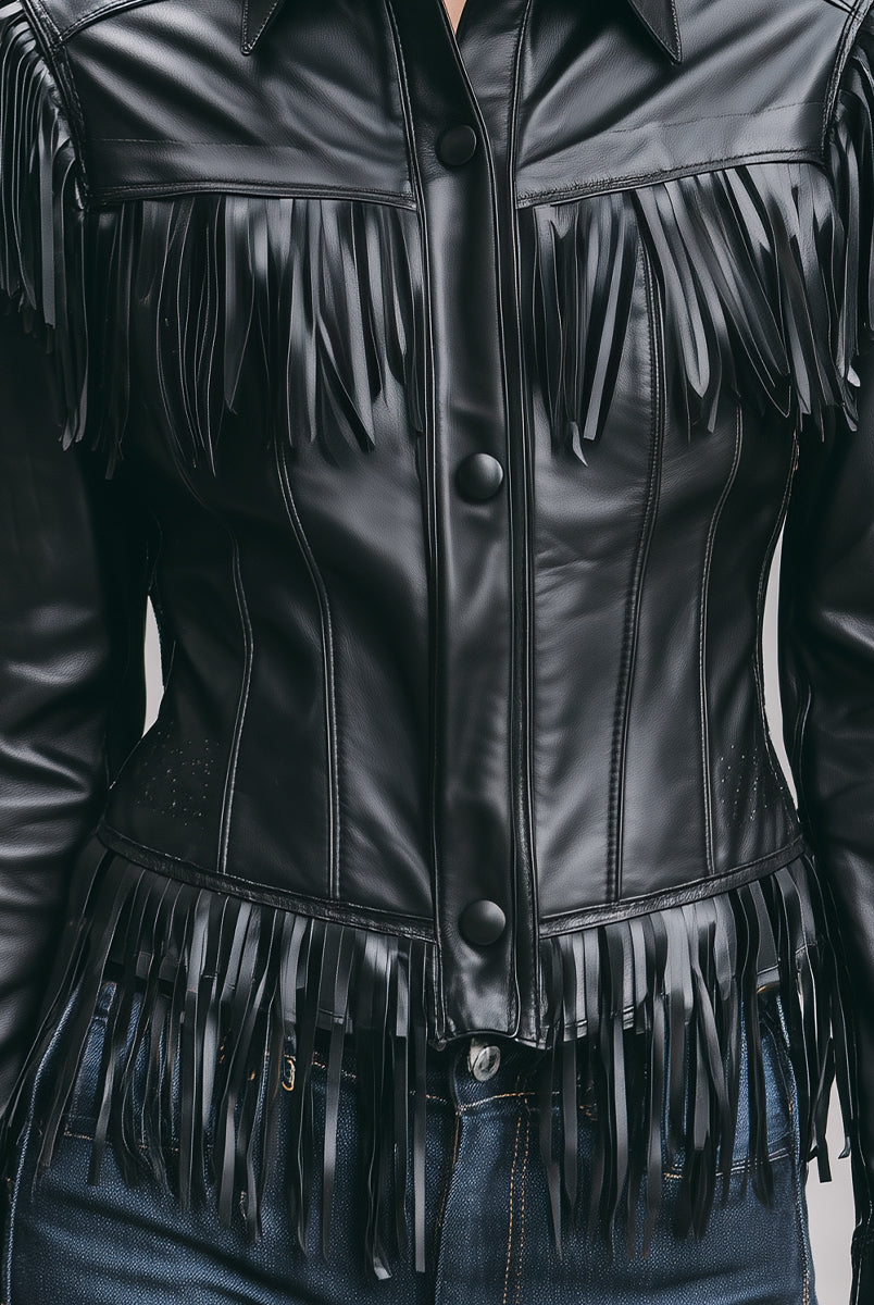 Black faux leather Winona jacket with black fringe by Lumina Vancouver, shown on a model in size XS.