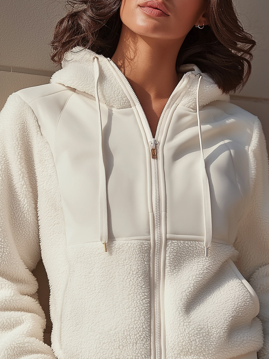 White Ida Lumina Vancouver hooded jacket with zip front and fleece panels, shown on a model in size XS.