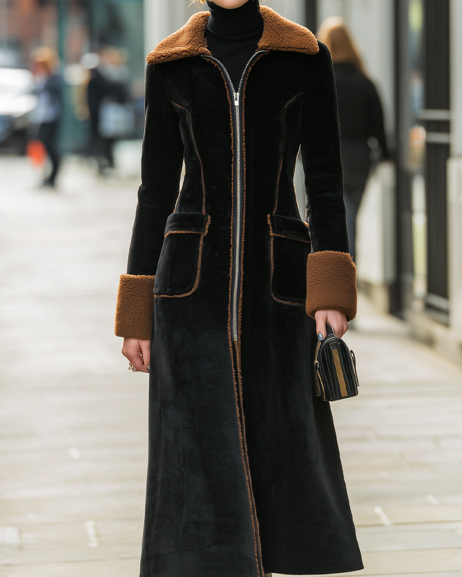 Long plush black coat with elegant contrast trim from Lumina Wear, featuring a stylish and cozy design.