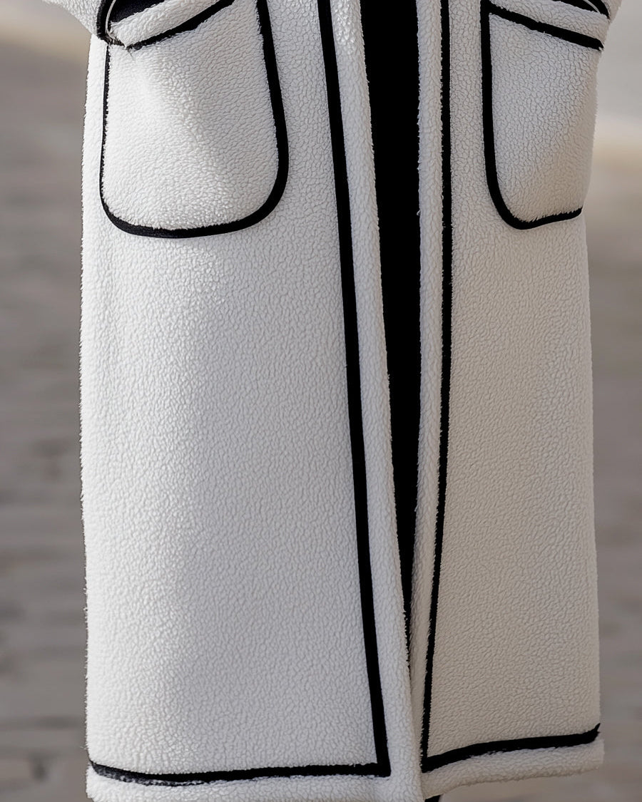 Longline wool-blend coat with contrast piping in white, by Lumina Wear, featuring a tailored fit and stylish design.