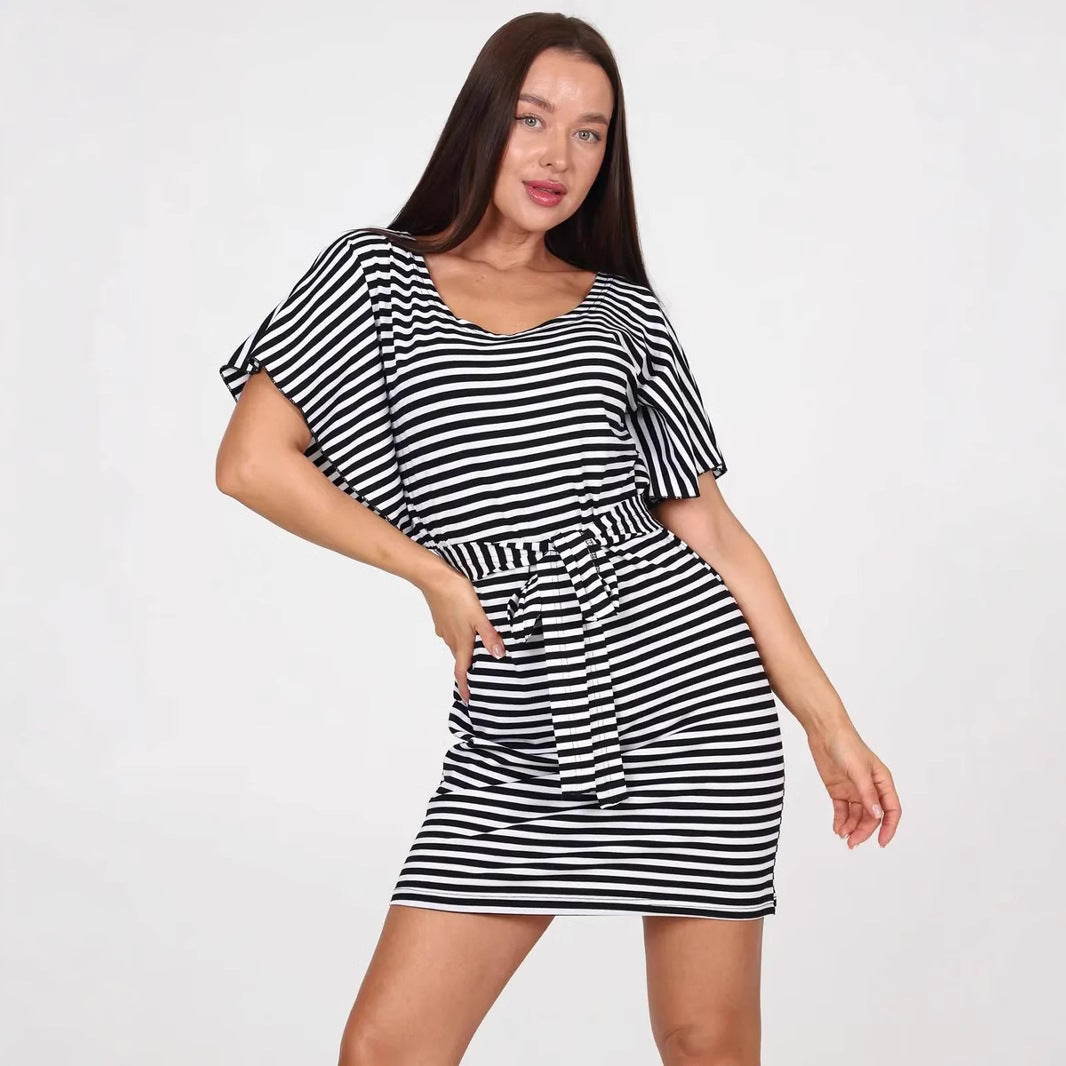 Black Elena mini dress with stripes and belt by Lumina Vancouver, featuring a fitted silhouette and stylish design.