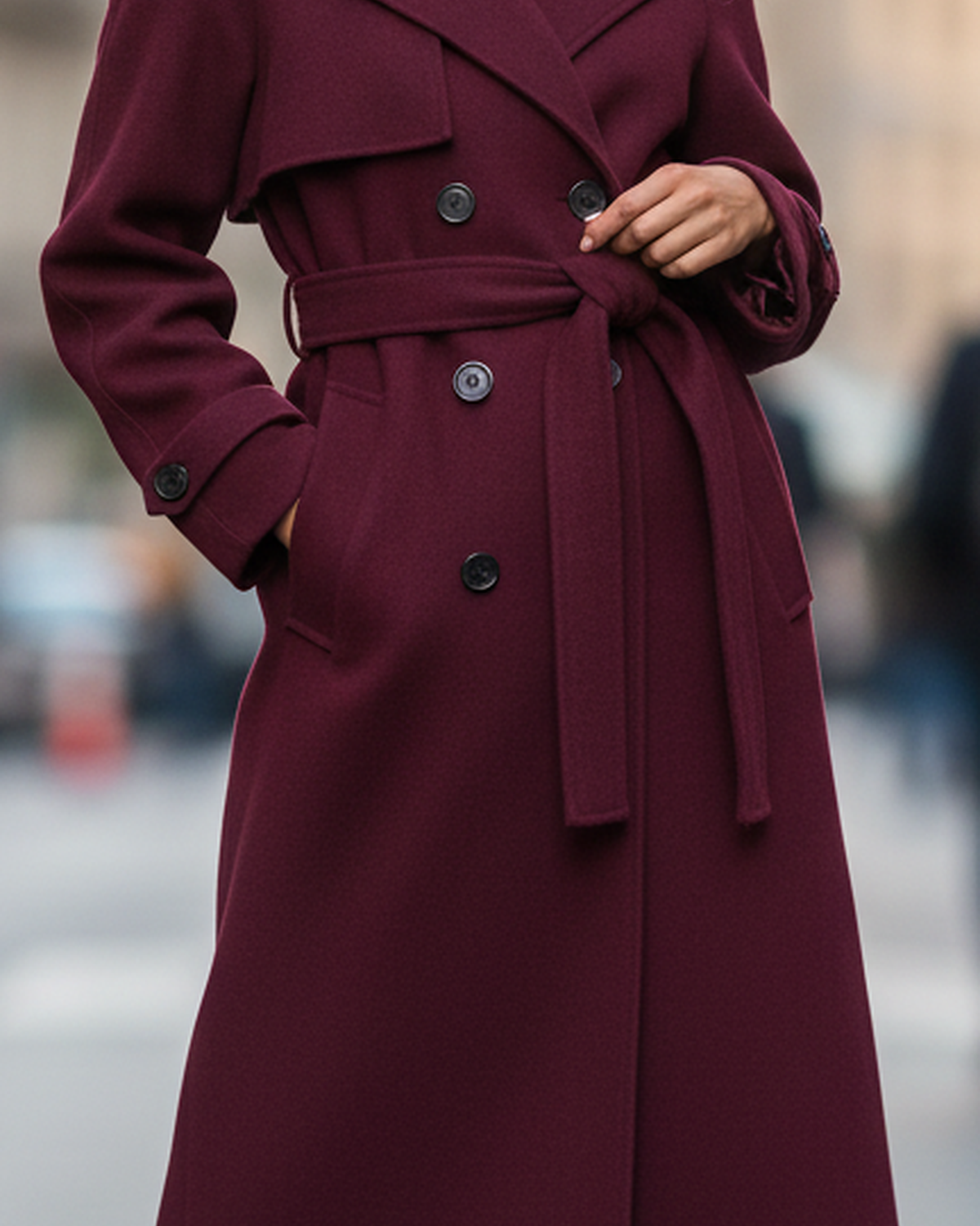 Structured burgundy trench coat with feminine fit from Lumina Wear, shown on a model, featuring tailored design and classic collar.