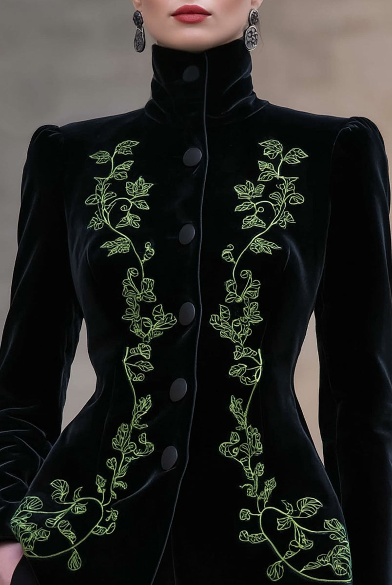 Black Bettina tailored blazer by Lumina Wear featuring high neck and velvet embroidery, shown on a model.