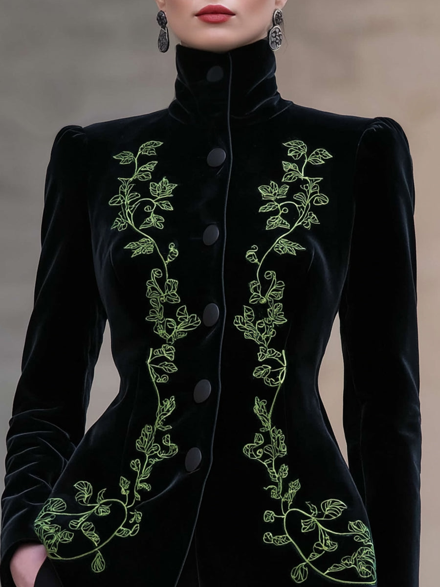 Black Bettina tailored blazer by Lumina Wear featuring high neck and velvet embroidery, shown on a model.