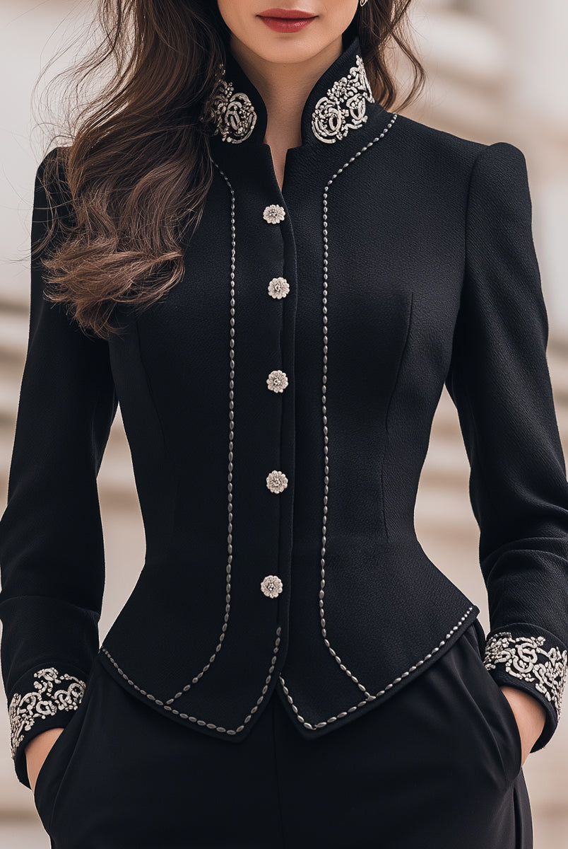 Black Lumina Wear blazer with tailored fit and ornate embroidery, featuring detailed embroidery on the front and sleeves.