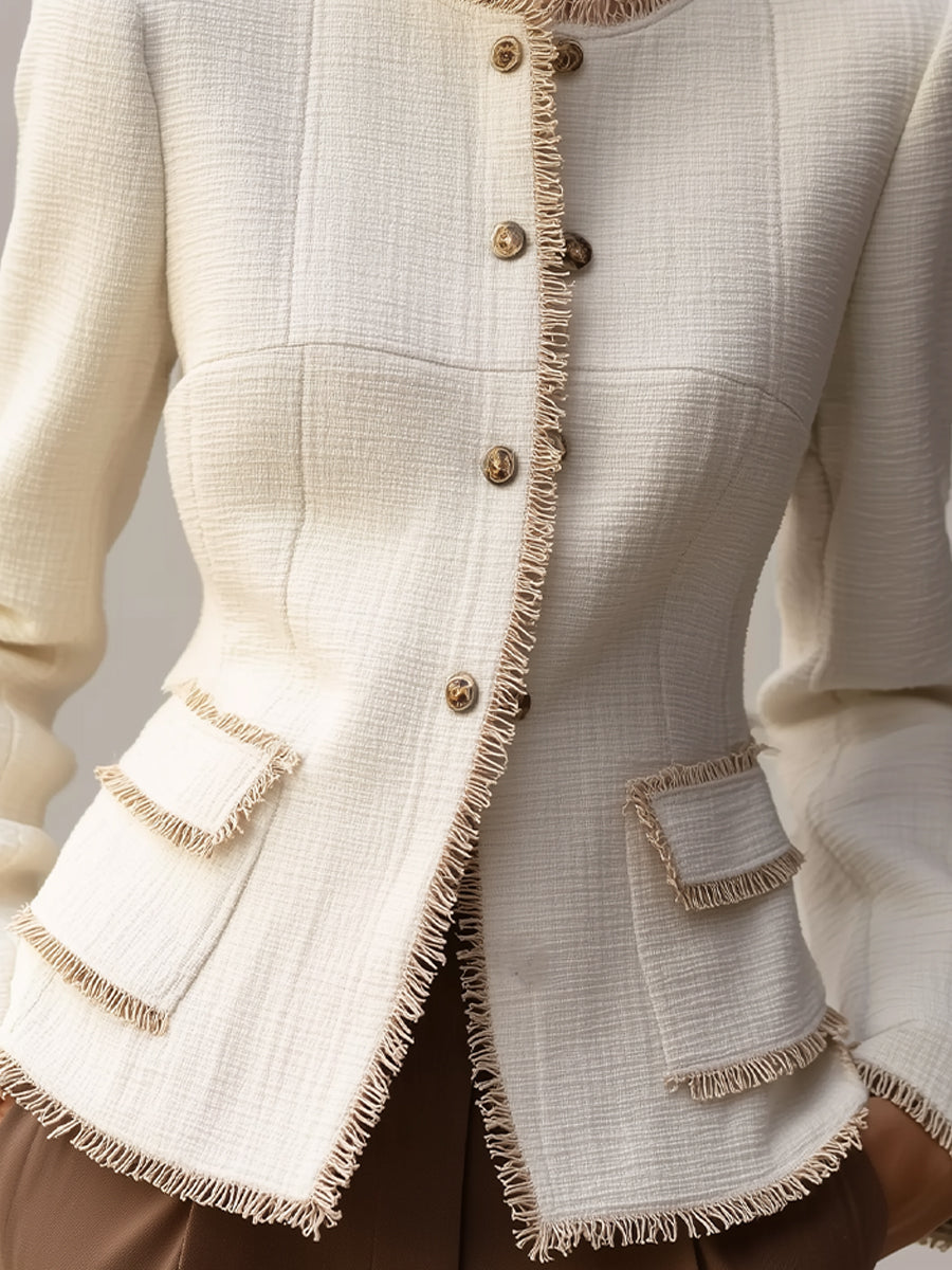 Cream textured blazer with decorative trim from Lumina Wear, styled with a tailored fit and elegant details.