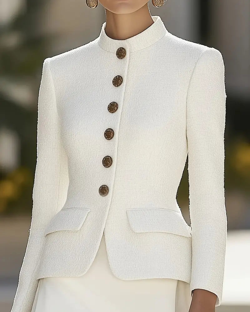 White Elena textured blazer with stand collar, gold buttons, by Lumina Wear, shown on a model.
