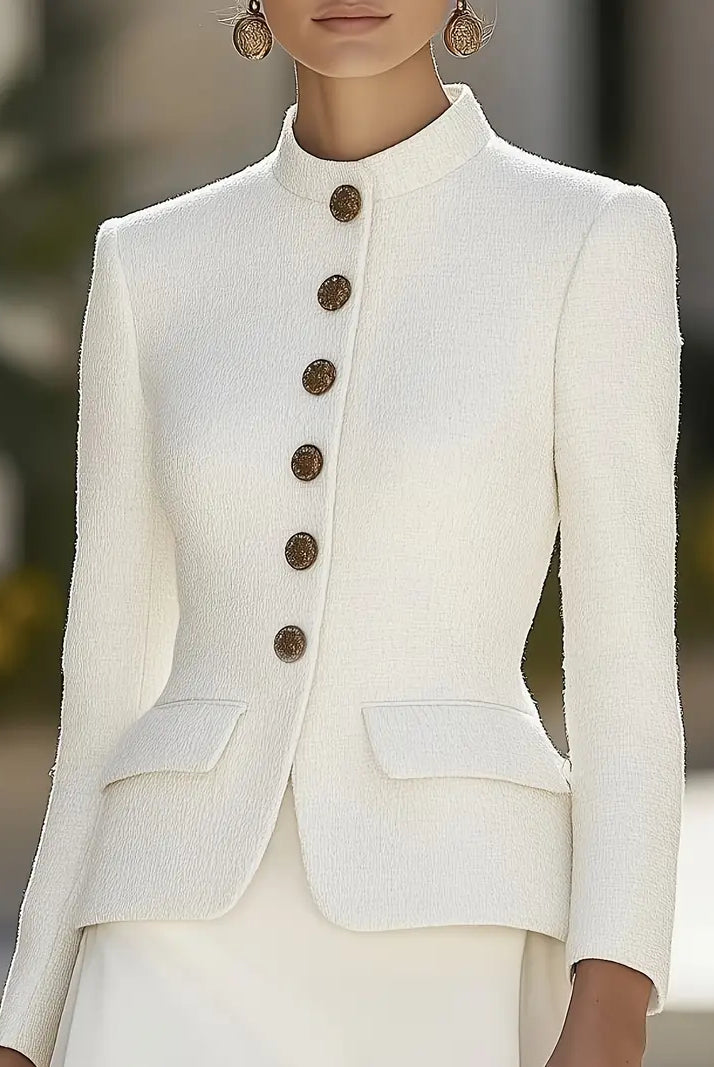 White Elena textured blazer with stand collar and gold buttons from Lumina Vancouver, shown on a mannequin.