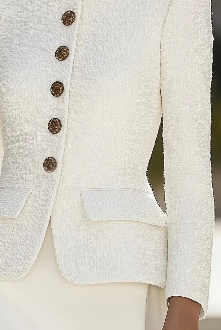 White textured blazer with stand collar and gold buttons from Lumina Vancouver, styled with a tailored fit and elegant details.