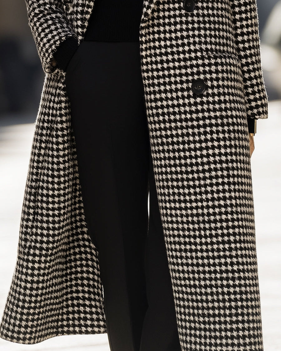 Black Marion Houndstooth Wool Long Coat by Lumina Wear, shown on a model, featuring classic pattern and tailored fit.