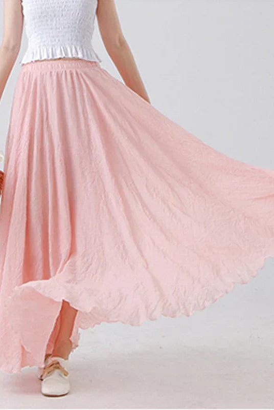 Elegant beige maxi skirt with high waist from Lumina Wear, shown in a flowing design perfect for stylish everyday wear.