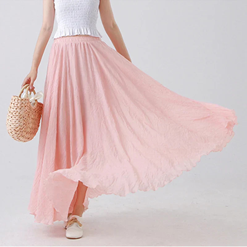 Elegant beige maxi skirt with high waist from Lumina Wear, shown in a flowing design perfect for stylish everyday wear.