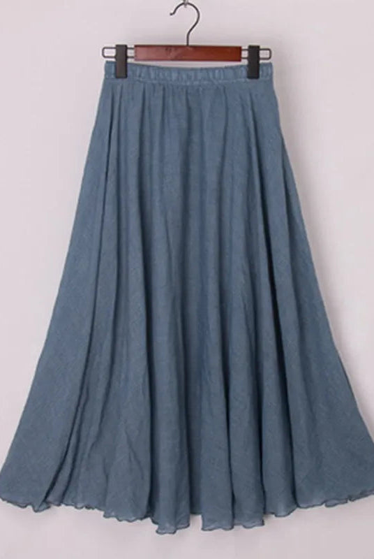 Elegant beige Elianne maxi skirt with high waist from Lumina Wear, shown on a black background, one size fits most.