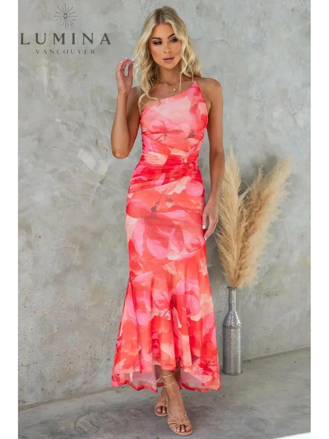 Blue Elora pleated summer dress by Lumina Wear, perfect for wedding guests, shown on a model.