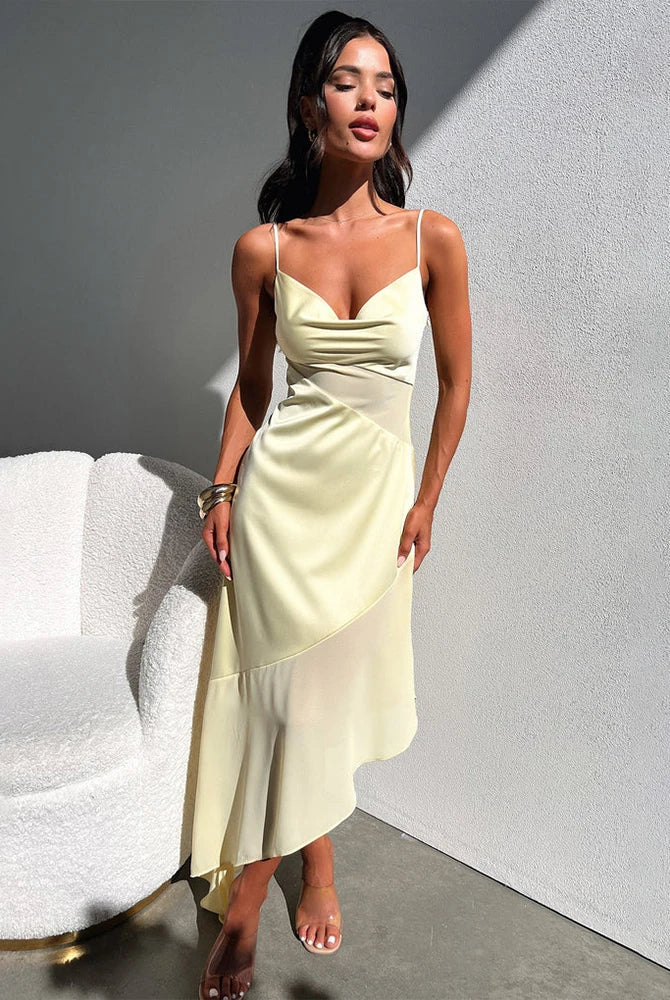 Black Elowen satin midi dress by Lumina Wear, elegant and flowing, displayed on a dress form against a neutral background.