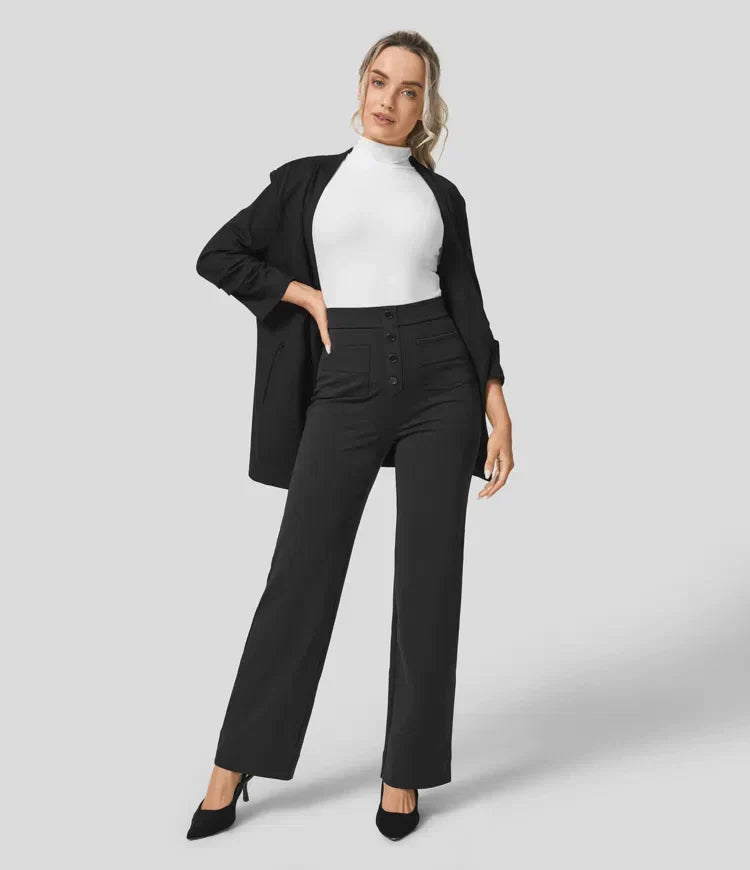 Elsa Lumina Wear high-waist black trousers with pockets, comfortable fit, casual style, shown on a model.