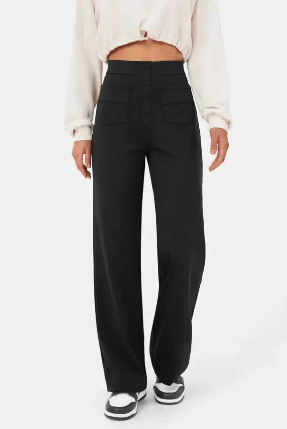 Elsa Lumina Wear high-waist black trousers with pockets, comfortable fit, stylish for casual or office wear.