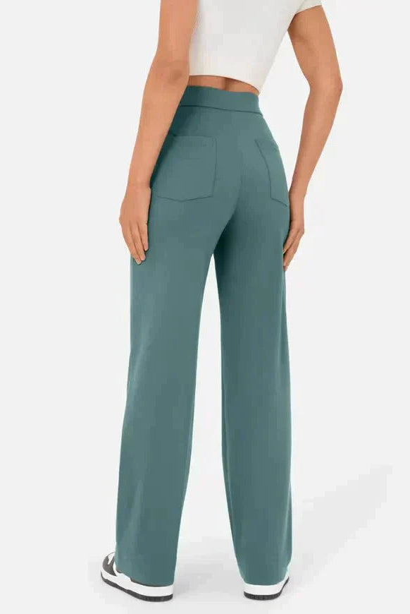 Elsa Lumina Wear high-waist black trousers with pockets, featuring a comfortable fit and stylish design, shown in the image.