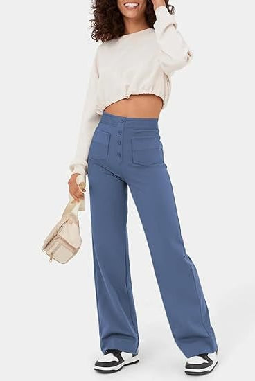 Elsa Lumina Wear high-waist black trousers with pockets, made for comfort and style, shown in a dark blue color.