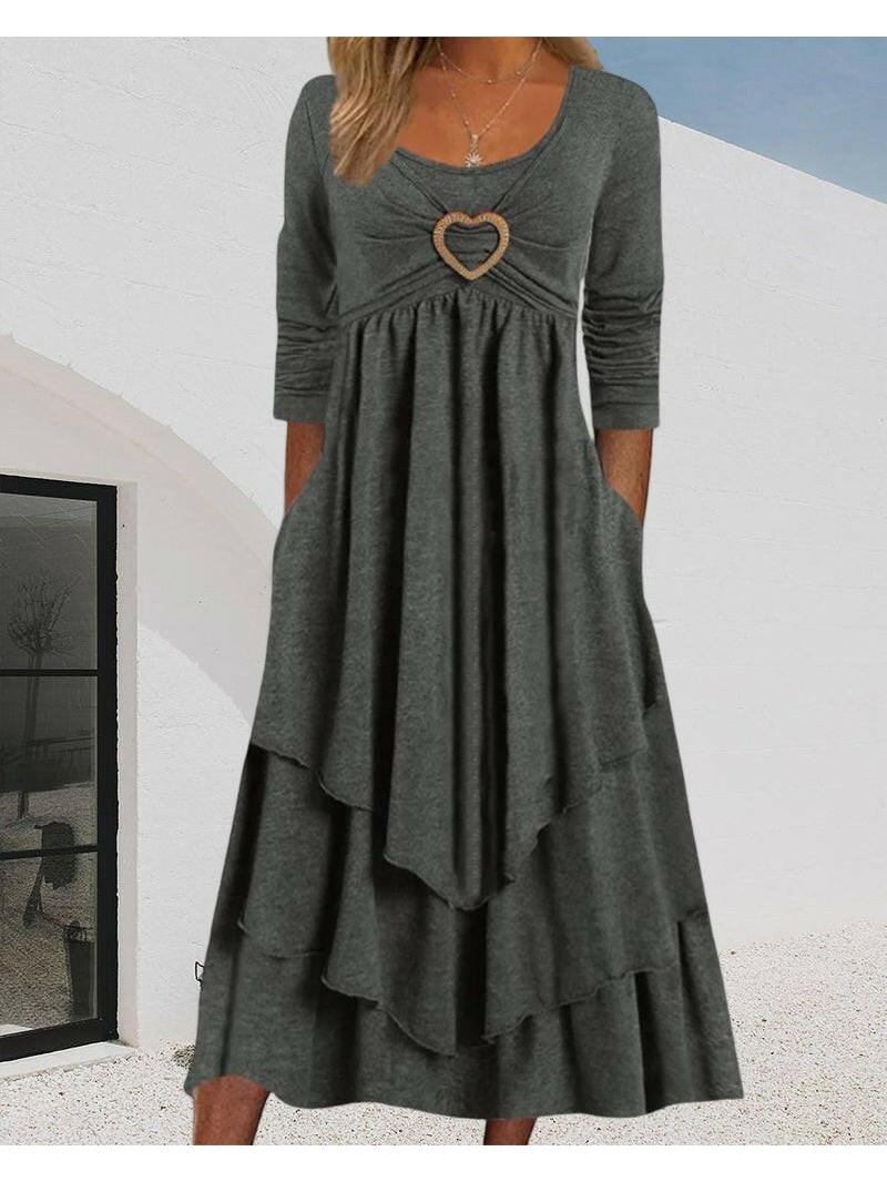 Gray Elsa Heart Detail Tiered Dress by Lumina Vancouver, featuring a feminine silhouette and decorative heart accents.