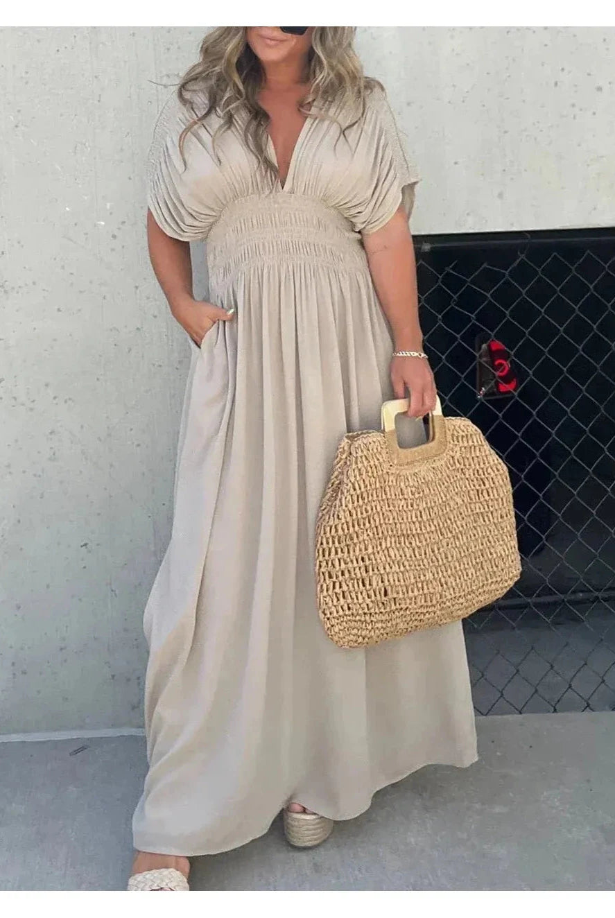 Lumina Vancouver Elyse™ elegant maxi dress in stone color, flowing fabric, perfect for formal occasions or summer events.