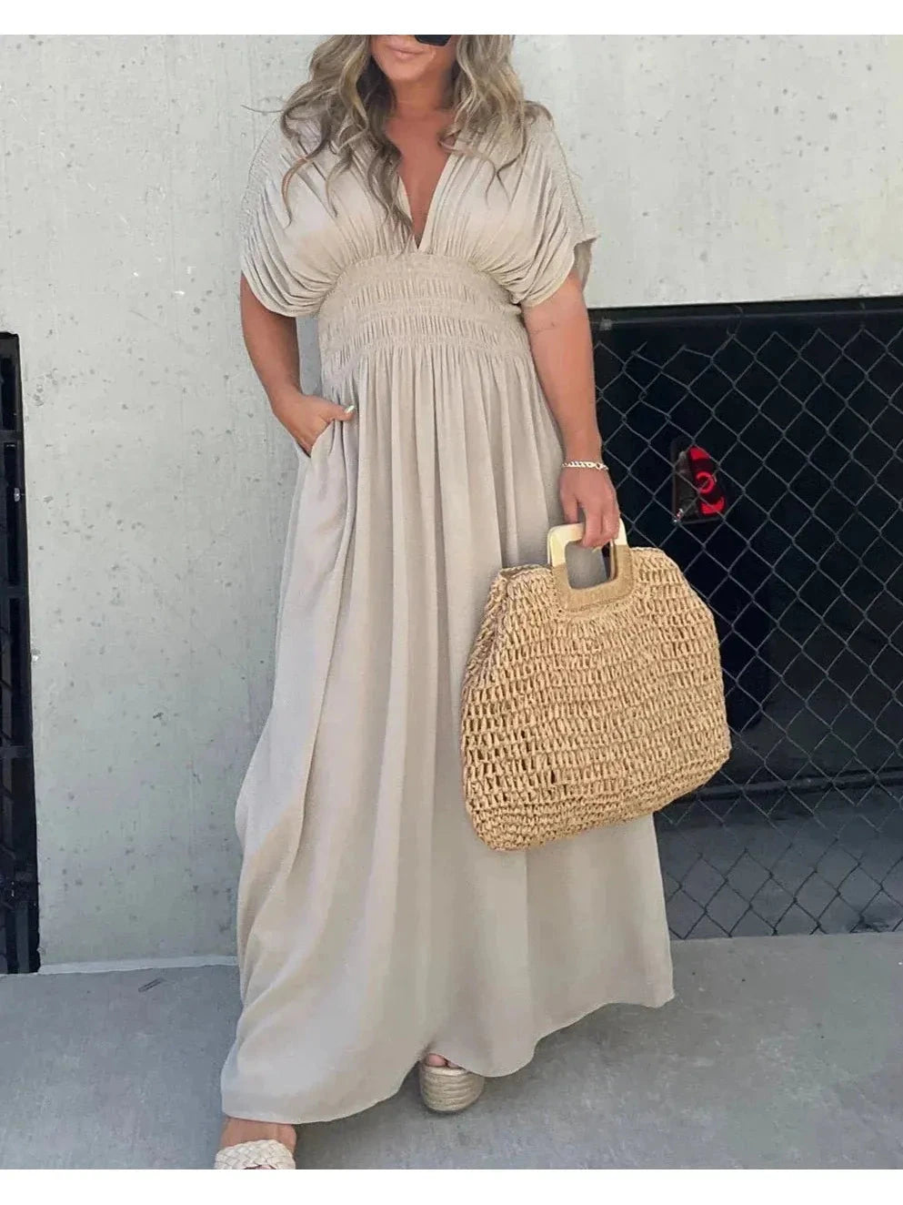 Lumina Vancouver Elyse™ elegant maxi dress in stone color, flowing fabric, perfect for formal occasions or summer events.