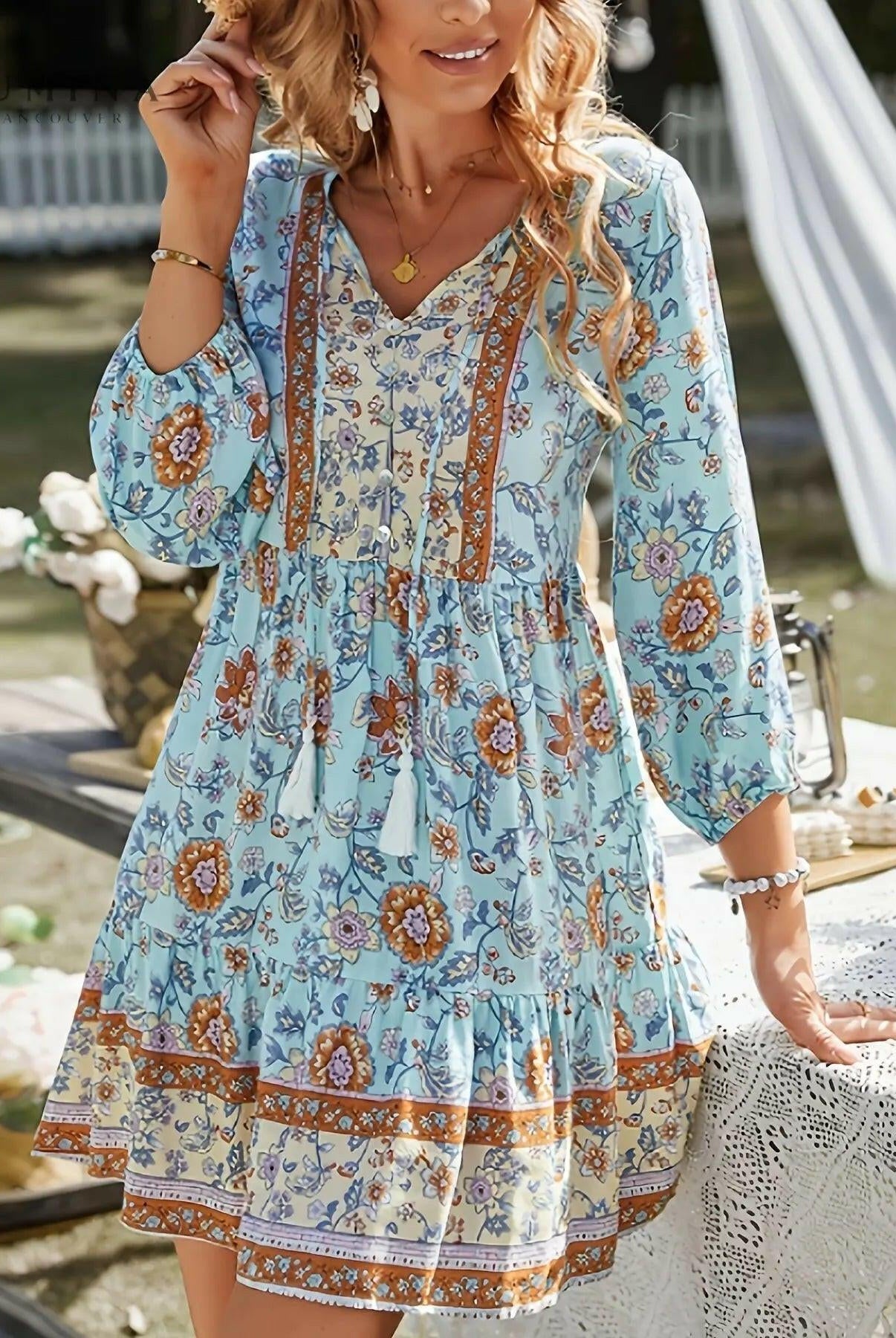 Sky blue Katariina boho dress by Lumina Wear with flowing fabric, sleeveless design, and bohemian style.