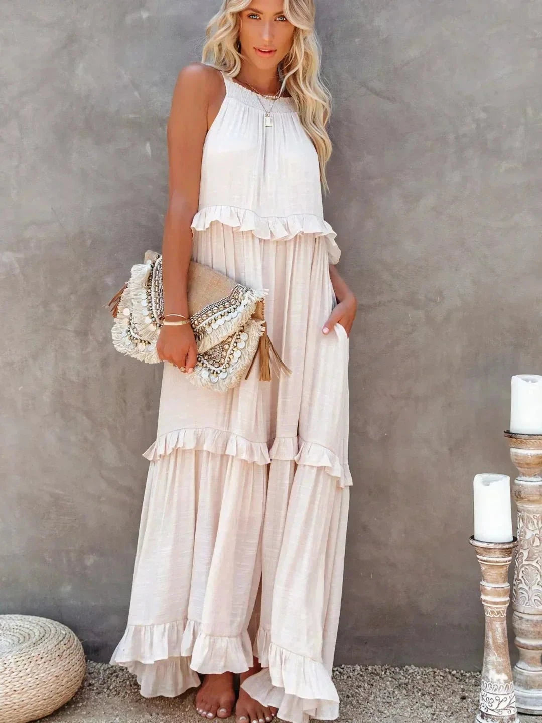 Laila halter ruffle maxi dress in apricot by Lumina Vancouver, flowing fabric with ruffle details, sleeveless design.