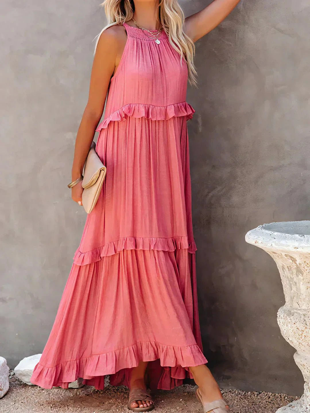 Laila halter ruffle maxi dress in apricot by Lumina Vancouver, featuring flowing fabric and elegant ruffle details.