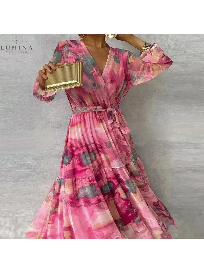 Emily elegant floral wedding guest dress by Lumina Vancouver, featuring a flowy design and vibrant floral pattern.