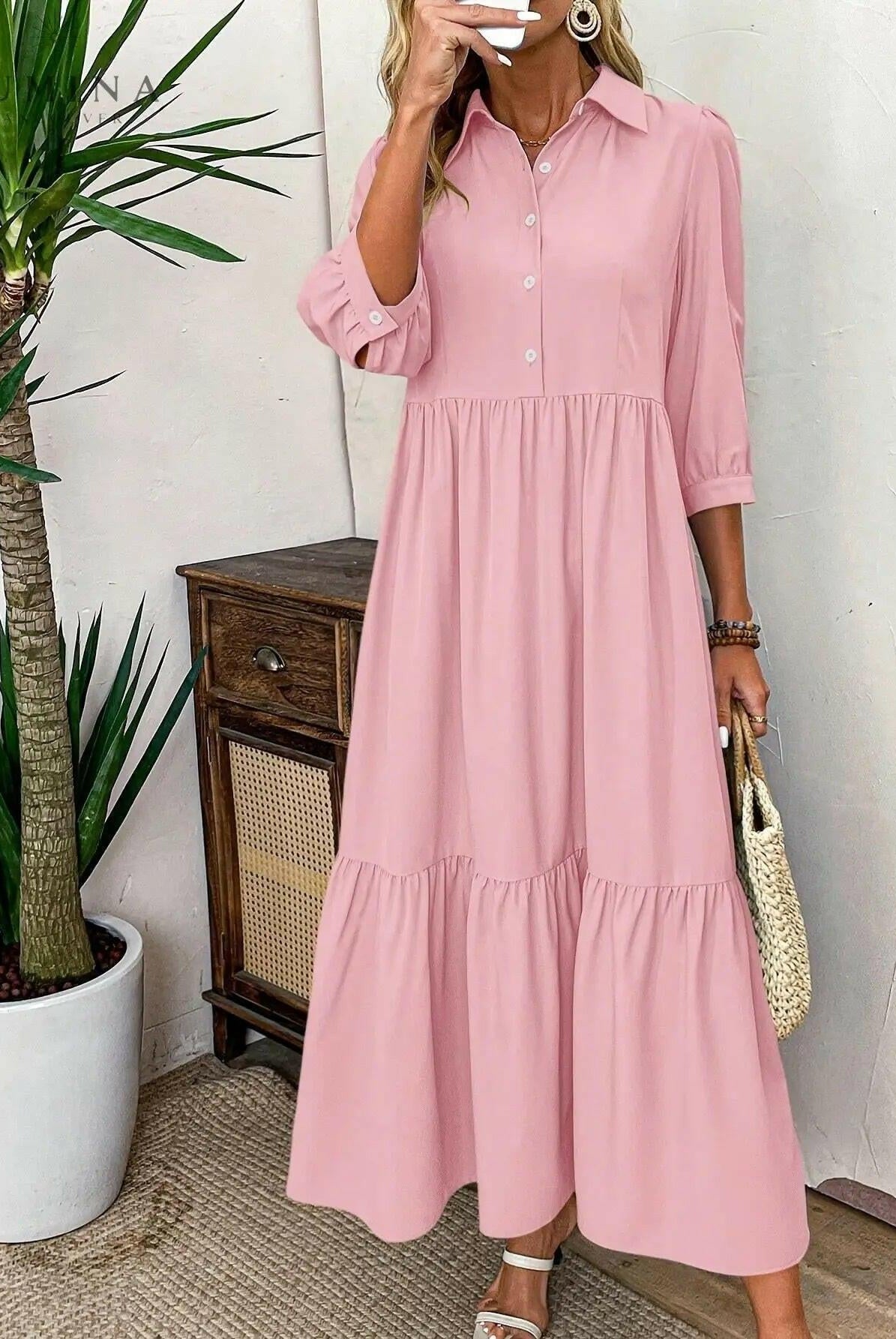 Pink Embla Button Dress by Lumina Wear, shown on a model, featuring a stylish, casual design perfect for everyday wear.