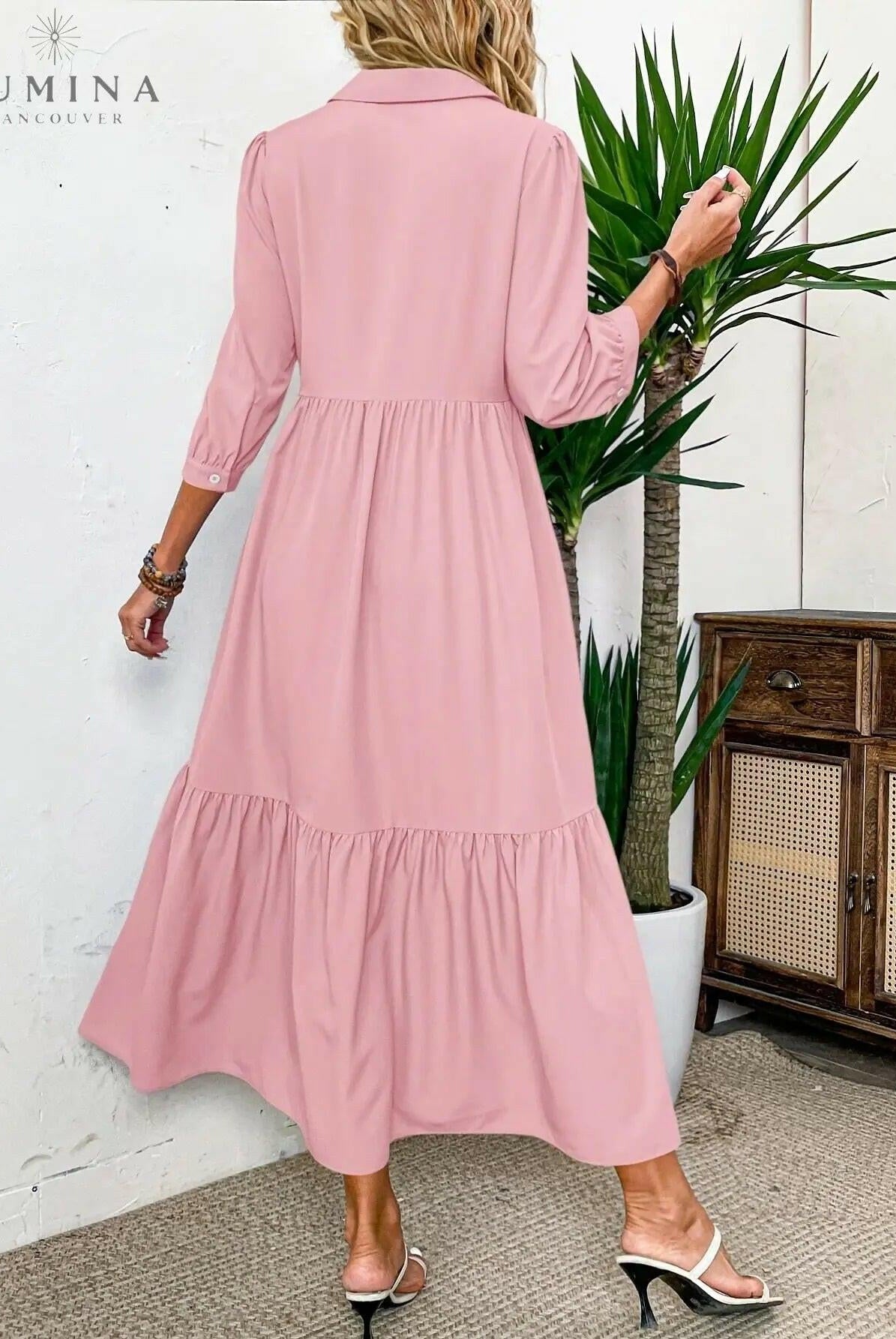 Pink Embla Button Dress by Lumina Wear, featuring a fitted silhouette and button details, displayed on a mannequin.