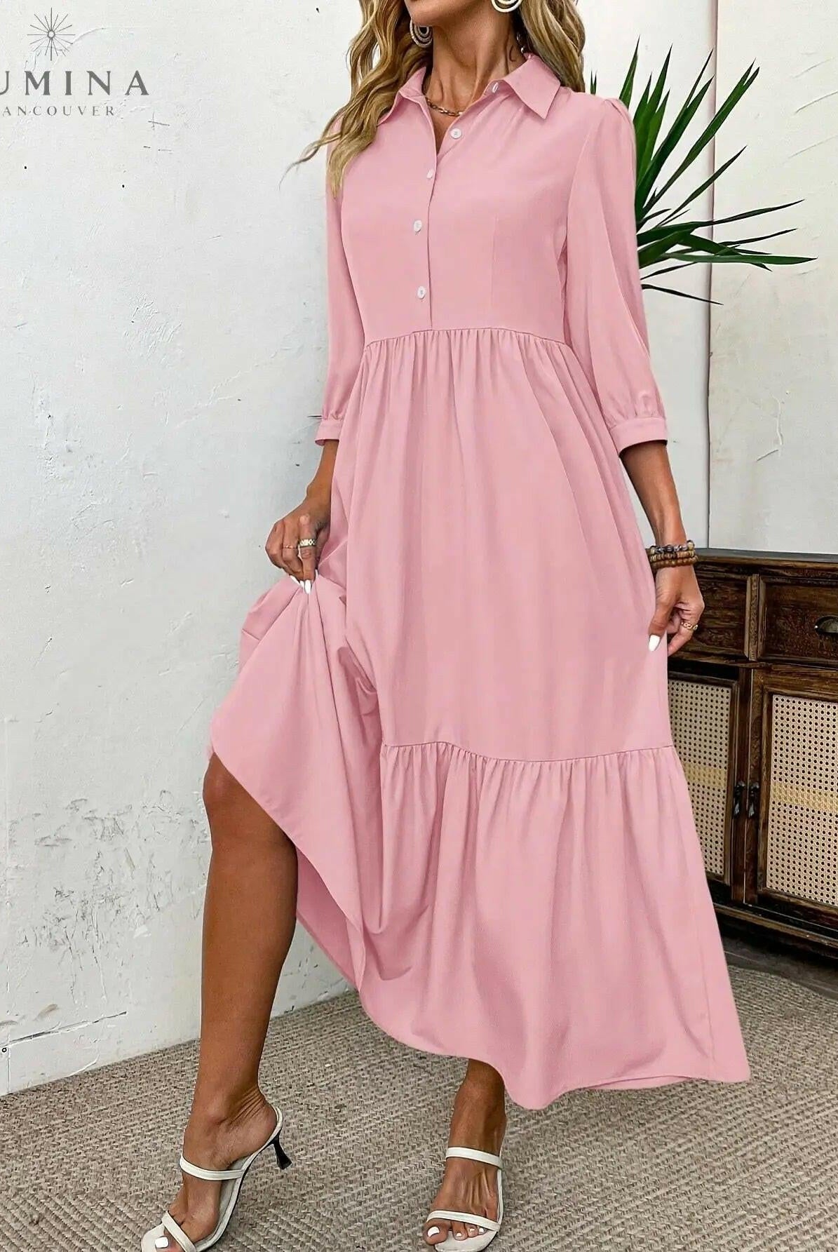 Pink Embla Button Dress by Lumina Wear, featuring a stylish design and buttons, displayed on a model.