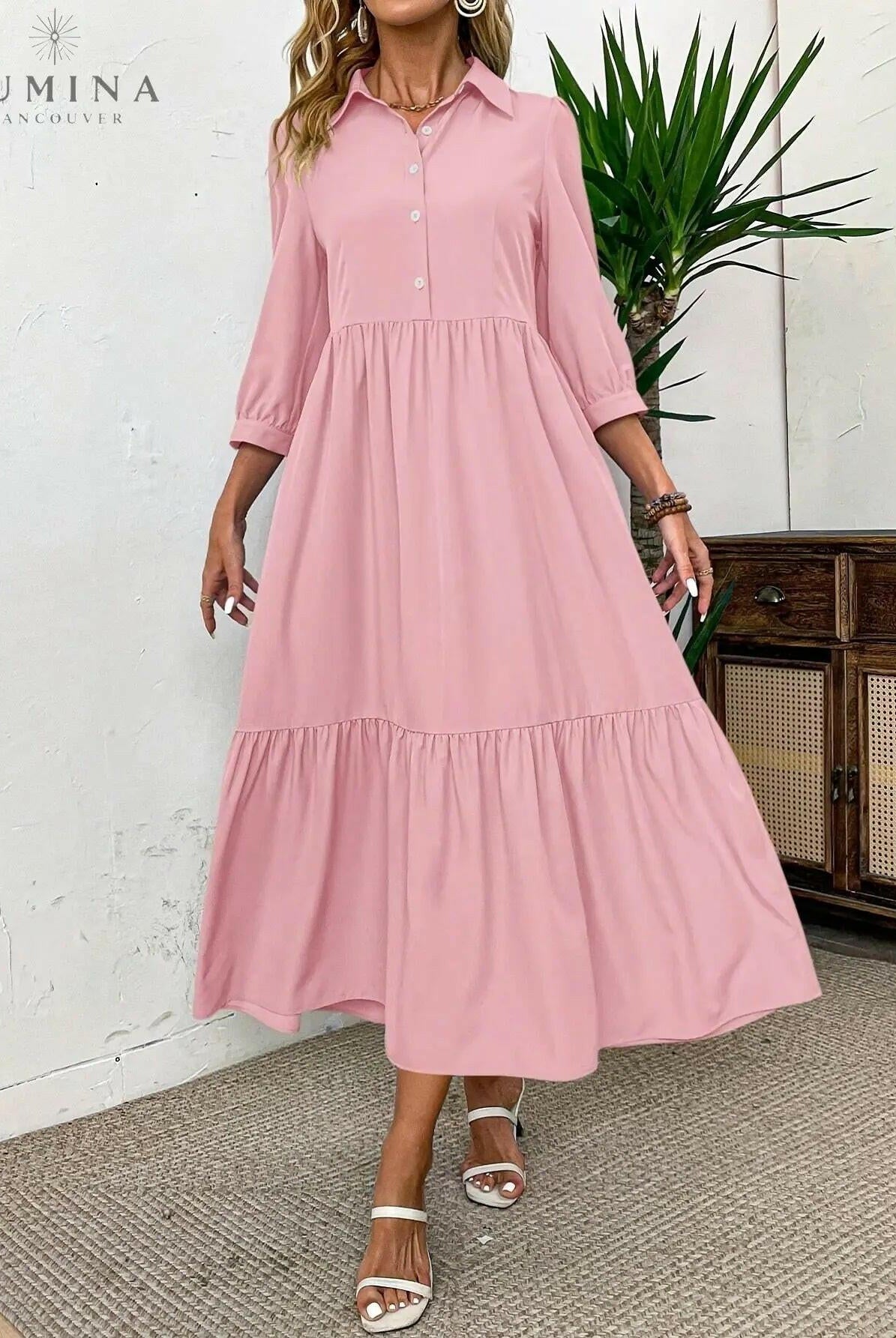 Pink Embla Button Dress from Lumina Wear, featuring a stylish design with buttons, displayed on a model in Vancouver.
