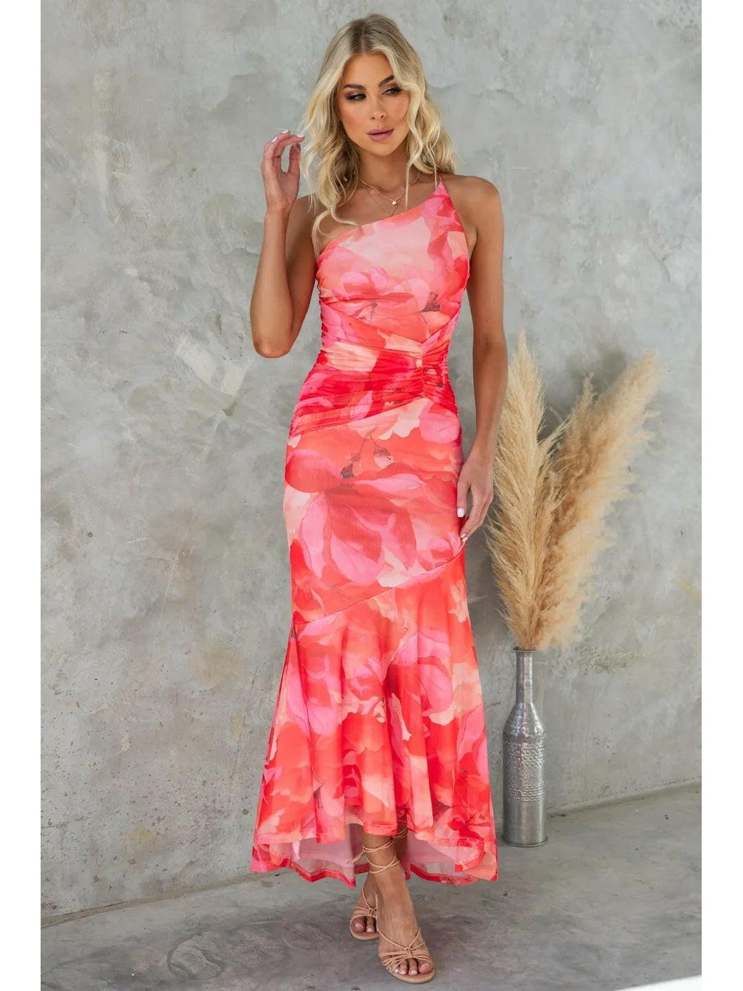 Blue Zelie floral summer dress by Lumina Vancouver, perfect for wedding guests, with a lightweight, flowy design and vibrant floral pattern.
