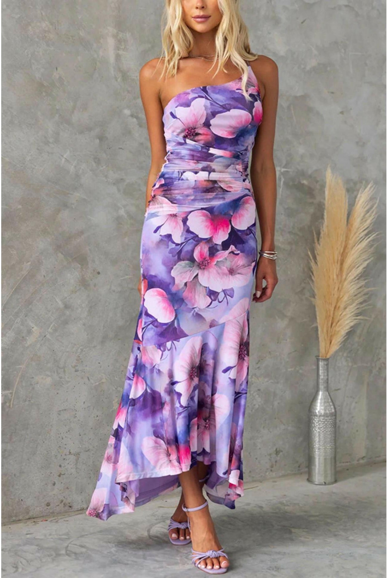 Blue floral summer dress by Lumina Wear, Zelie style, featuring lightweight fabric and elegant design for warm-weather occasions.