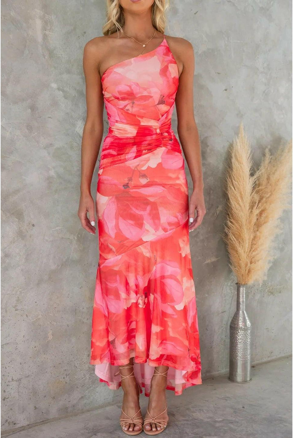 Blue Zelie floral summer dress by Lumina Wear, featuring a lightweight fabric and feminine floral pattern, perfect for warm weather.