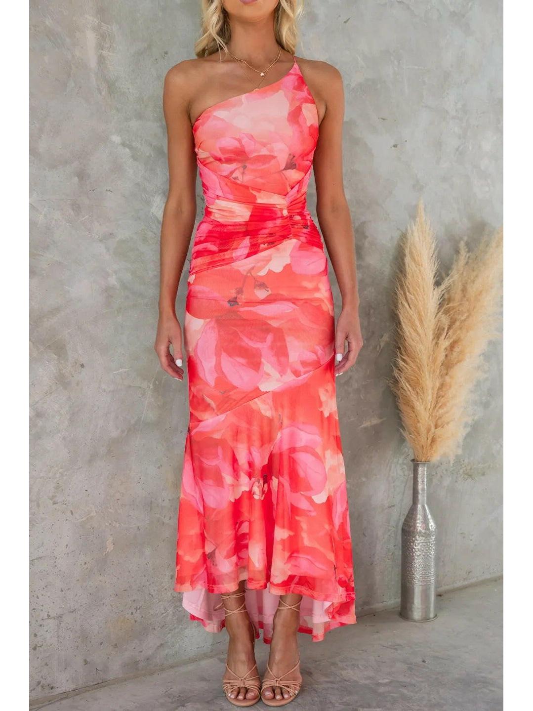 Blue Zelie floral summer wedding guest dress by Lumina Vancouver, featuring a lightweight, elegant design with floral patterns.