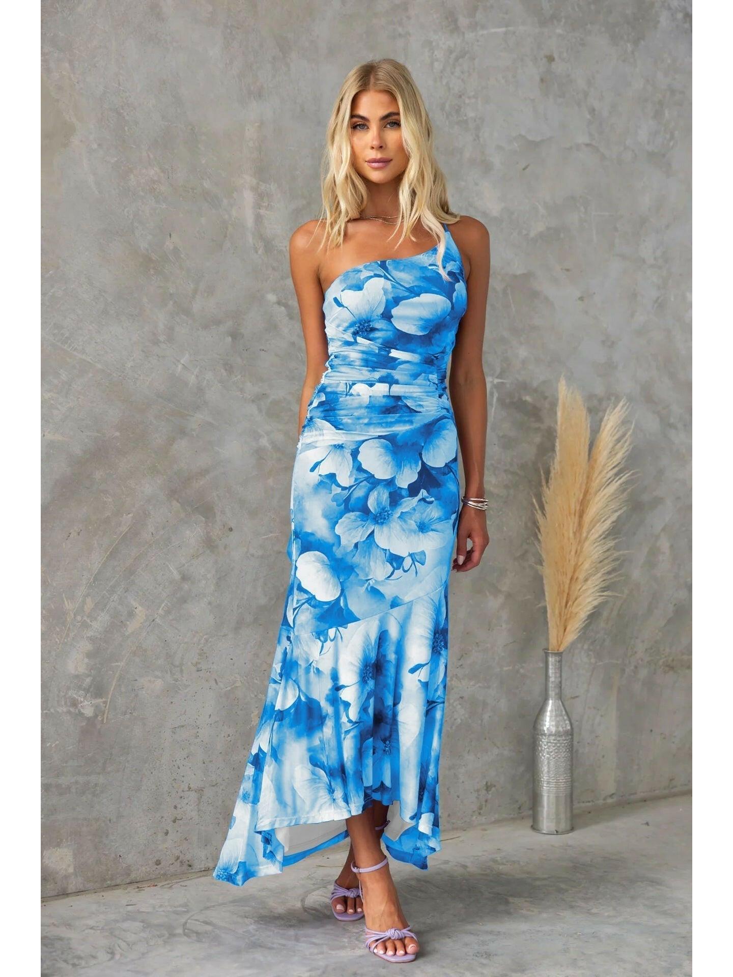 Blue Zelie floral summer dress by Lumina Vancouver, perfect for wedding guests, featuring a lightweight, elegant floral design.
