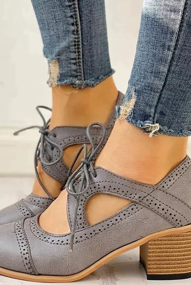 Black Evelyn T-strap heels by Lumina Wear, stylish women's shoes with modern design and elegant T-strap detail.