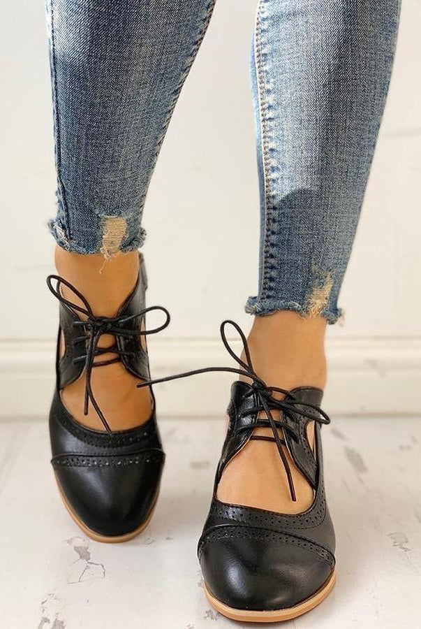 Black Lumina Wear Evelyn T-strap heels for women featuring an elegant design with a modern touch and stylish heel.