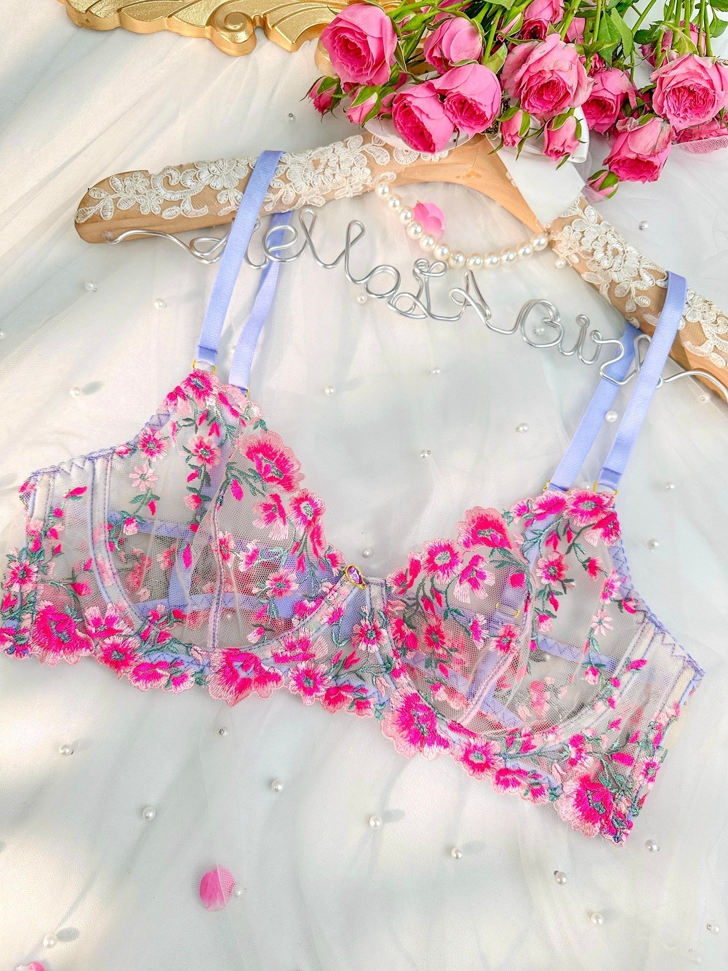 Pink fantasy bloom embroidery lingerie set, Lumina Vancouver 3-piece satin and lace bra, panties, and garter belt on a model.