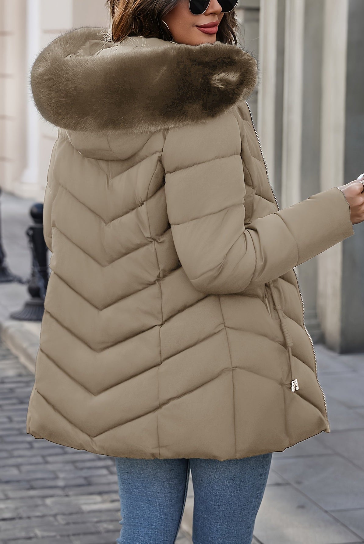 Black Lumina Wear Florence quilted puffer coat with faux-fur hood, stylish winter outerwear for cold weather.
